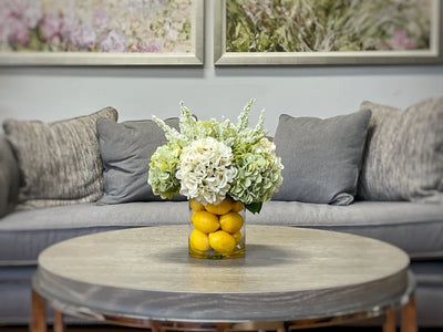 Hydrangeas Arranged in Glass Vase with Lemons
