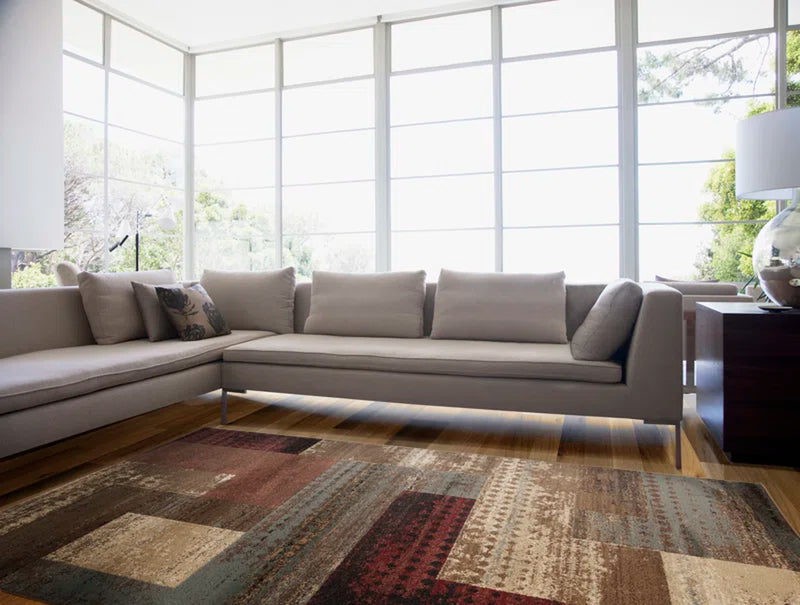 Fegan Geometric Brown Area Rug